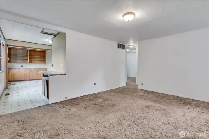 The kitchen is off the living room for easy flow gatherings.