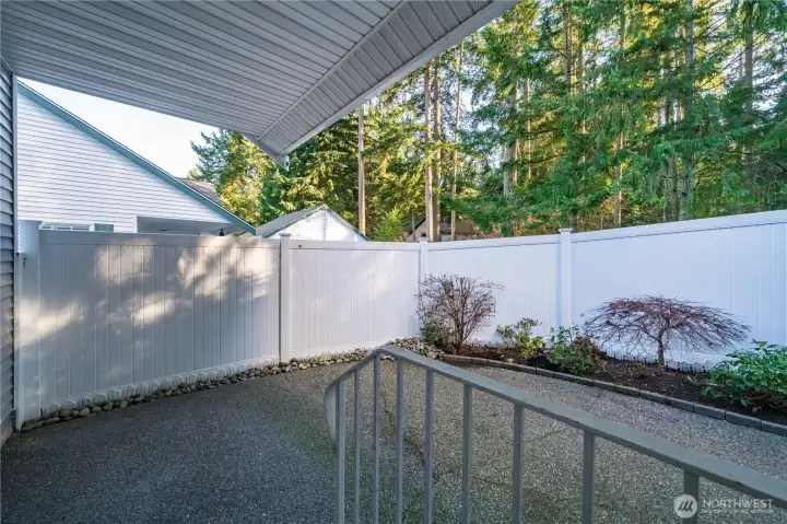 Just outside you will find a delightful, covered patio, perfect for morning coffee or al fresco dining.