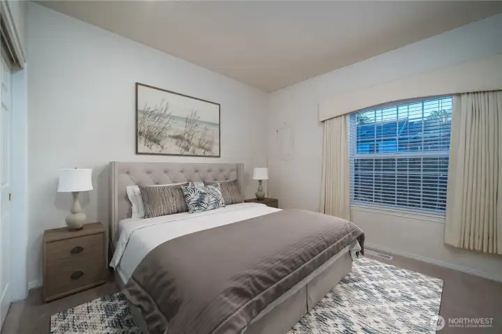Guests will appreciate this extra-spacious secondary bedroom.
