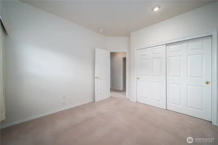 The secondary bedroom features a large closet as well.