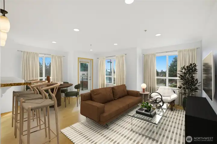 This light-filled living space is designed to maximize natural sunlight throughout the day, creating a warm and inviting atmosphere year-round.