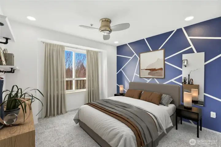 The primary suite includes its own bath, creating a comfortable and private retreat.