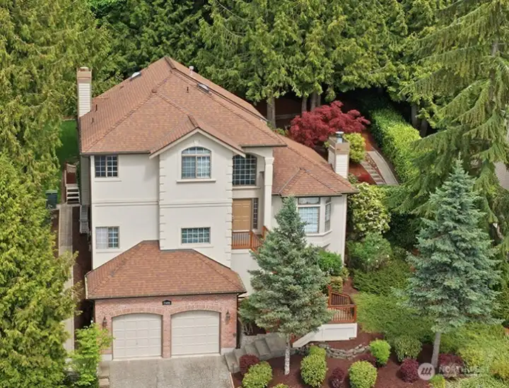 Main floor with formal rooms, family and bonus rooms has access to a great backyard