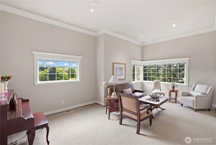 Spacious bonus room is on the main level