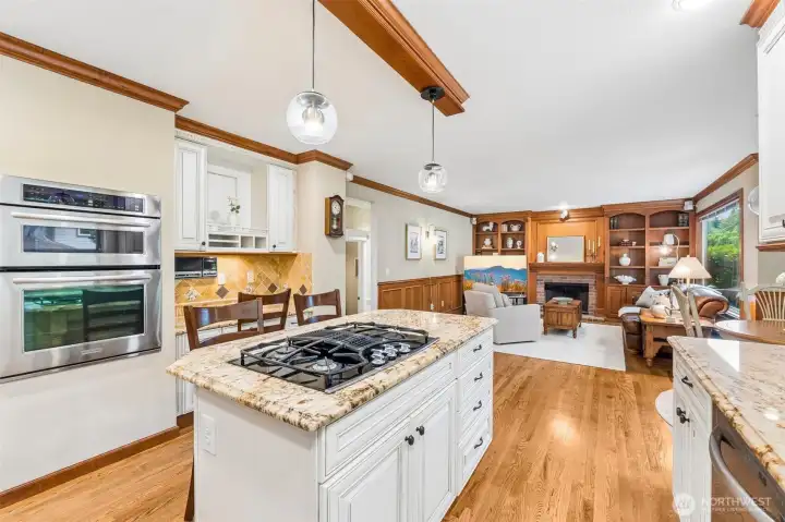 Kitchen has gas downdraft stove