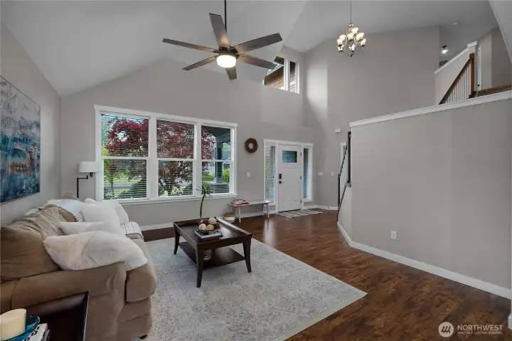 Light, bright, and designed to impress. Soaring ceilings, oversized windows, and warm finishes create a welcoming space that feels both open and cozy from the moment you walk in.