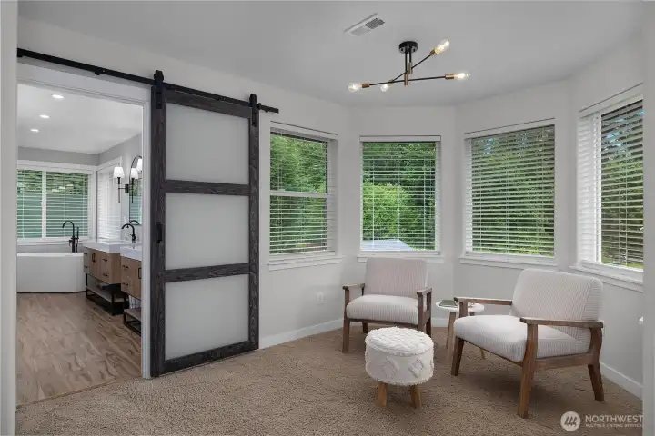 Primary bedroom sitting area with so many possibilities.