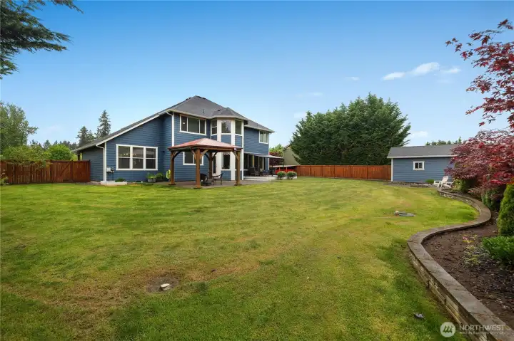 The backyard you’ve been waiting for. Huge fully fenced yard with multiple entertaining areas, RV parking, and a storage shed — offering the perfect blend of space, function, and outdoor living.