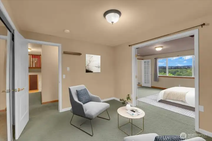 Second floor primary bedroom sitting area ( virtually Staged )