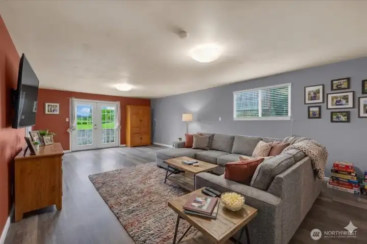 Another angle of Lower level bonus room ( Virtually Staged )