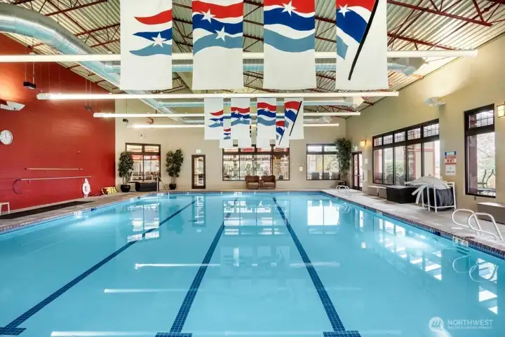 Pool area with hot tub offers complimentary classes and lap swimming