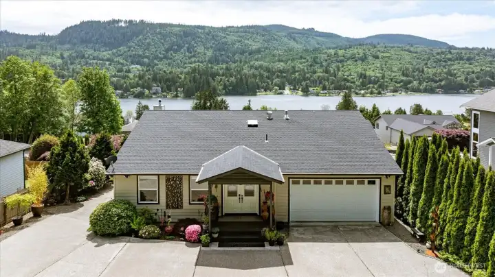 Welcome to 24153 Walker Valley Road. Let's step inside and drink in the beauty of the interior and views of Big Lake!
