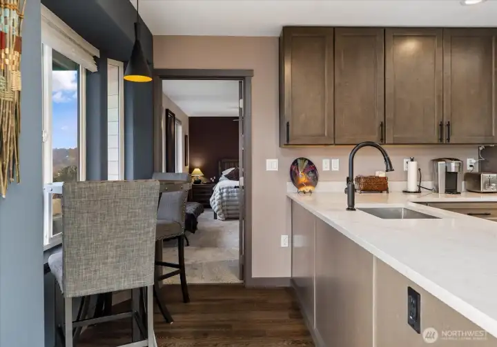 Off the kitchen is the primary suite. A haven for relaxation!