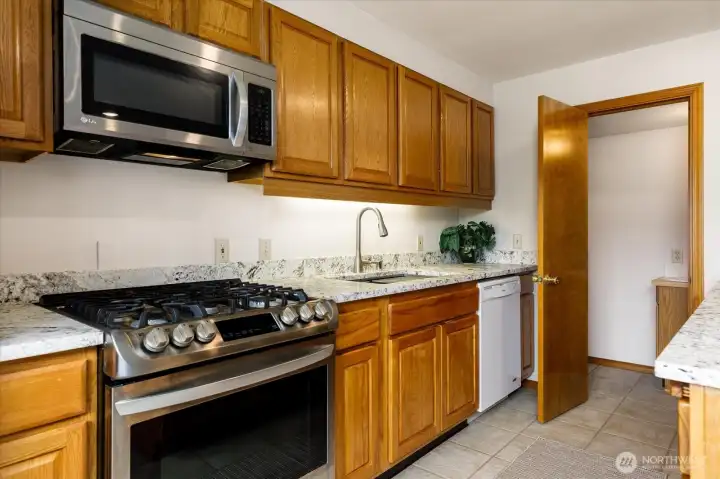 Stone countertops and all the appliances you'll need to be completely self-sufficient here.