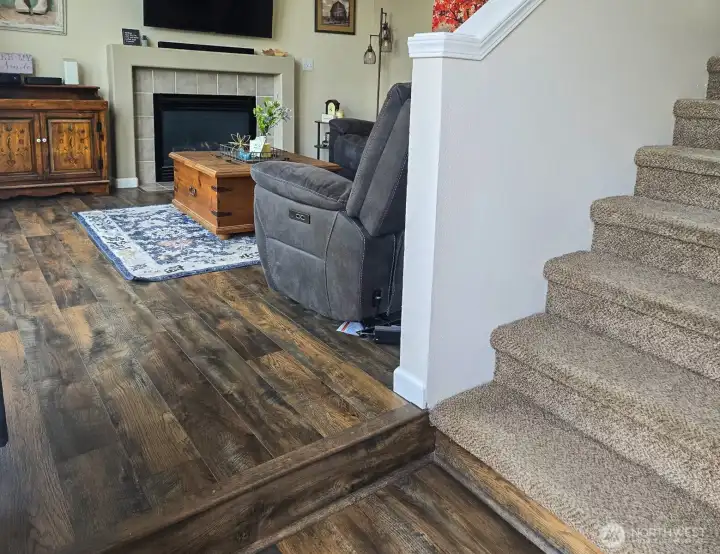 Immediately to your left as you enter the house and up one step is the living room. Immediately to your left as you enter the house and up one step is the living room.