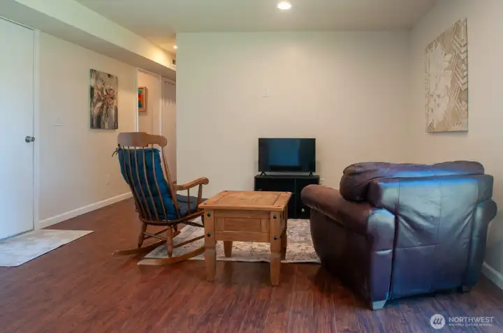 ... and down the hall is the family room and, on the left, door to the garage. ... and down the hall is the family room and, on the left, door to the garage.