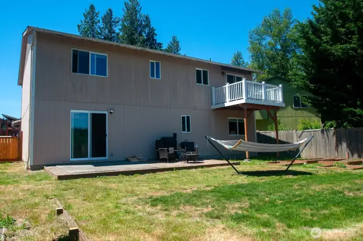 A reverse view of the back yard. A reverse view of the back yard.