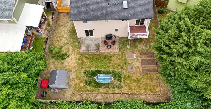 Aerial view of the home and yard. Aerial view of the home and yard.