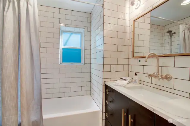 Check out the great light, amazing tile, carefully-chosen fixtures, lighting and hardware.