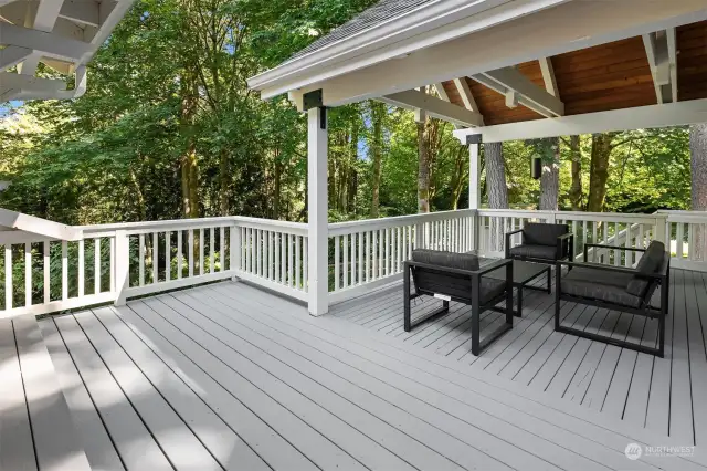 Spacious back deck with covered area for year round entertaining and outdoor use.