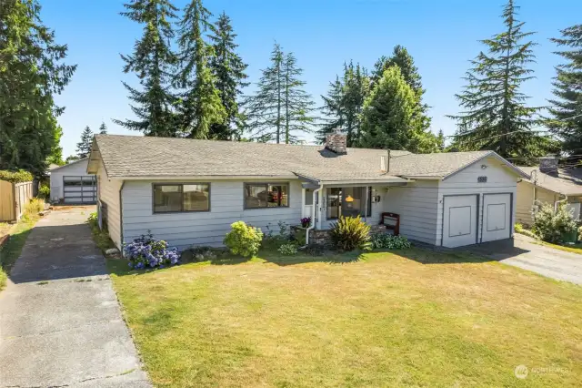 Dual driveways. One leads to back yard and shop. Approximately 24 x 24.