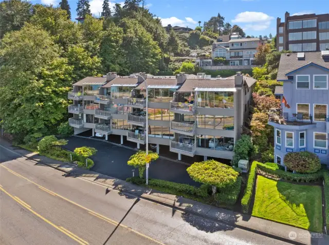 Built to take advantage of the stunning water views, this charming condominium includes characteristics only older buildings can offer including a wood burning fireplace, a large covered balcony & a common area for storage in addtion to individual unit storage.