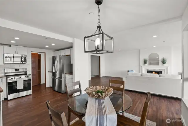 New luxury vinyl plank flooring flows seamlessly throughout the condominium, creating a cohesive and stylish connection between each room.