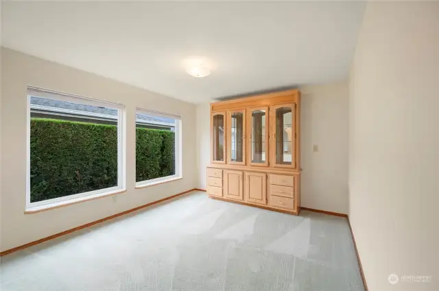 The dining room contains a built-in buffet.