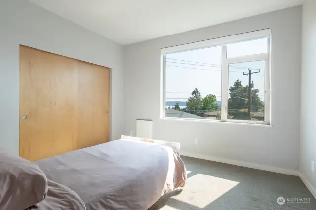 All bedrooms have expansive views of the lake and Mt Rainier.