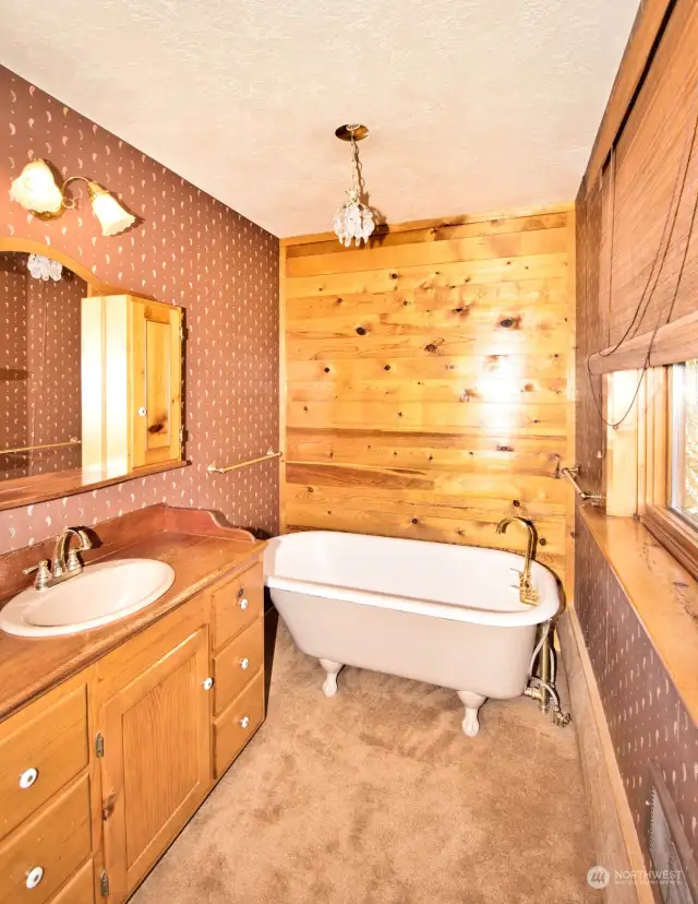 cast iron soaking tub in upstairs bath.