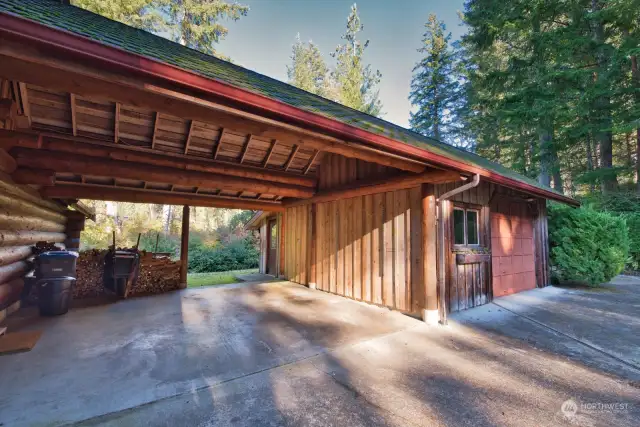 Single car garage as well as this covered breezeway with room for 2 cars.