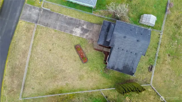 Drone view of property. Fully fenced-in