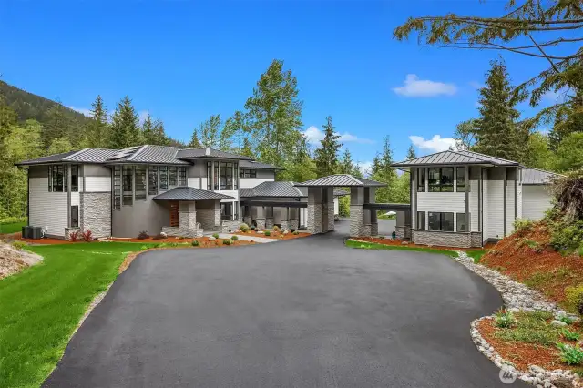 Welcome to a truly exceptional offering in the highly sought-after Uplands Reserve of North Bend — a luxurious modern home that seamlessly blends contemporary design, superior craftsmanship, and the natural beauty of the Pacific Northwest.