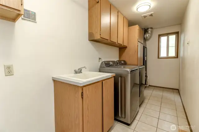 Very spacious laundry room for extra storage