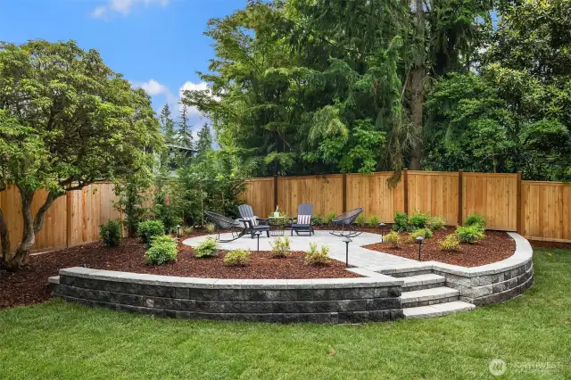Raised "Oasis" with stacked walls and pavers underfoot