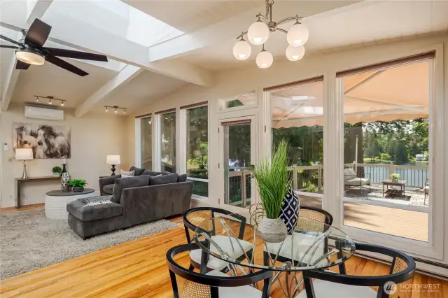 This is the South Facing, great room...oriented for views of Pine Lake...very sunny and bright.  The awning you see is retractable...and is on a remote control for easy use.
