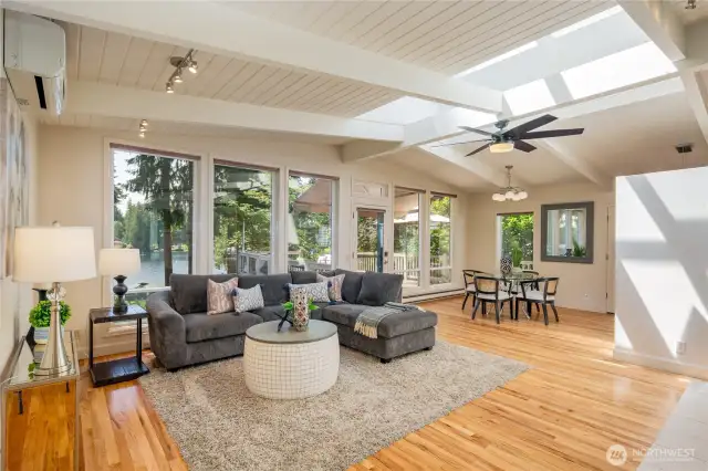 Look at all the natural light...and views of Pine Lake. There is a gas fireplace and mini-split for heat/AC.