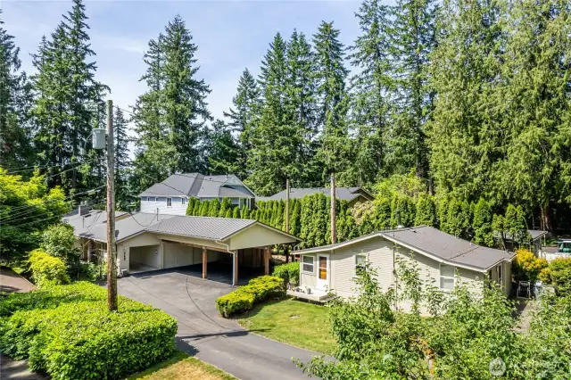 Main house on the left, cabin on the right.  The cabin is occupied by a long-term tenant.  Tenant would love to continue living there if you would like some rental income.  Ready to vacate if you want the cabin as a private guest house.
