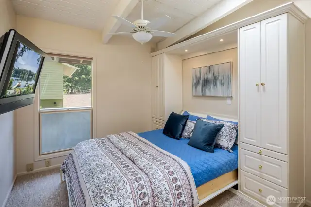Upstairs guest bedroom.  That Murphy bed folds up and becomes a desk.