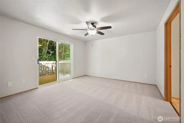 Primary bedroom with back yard access