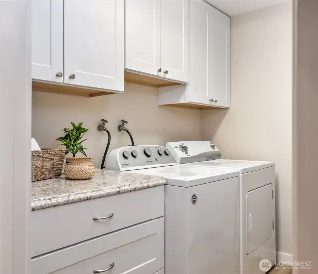 Laundry room off the hallway to the attached garage.