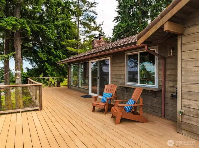 Sliding doors off dining area make entertaining on the deck a dream.