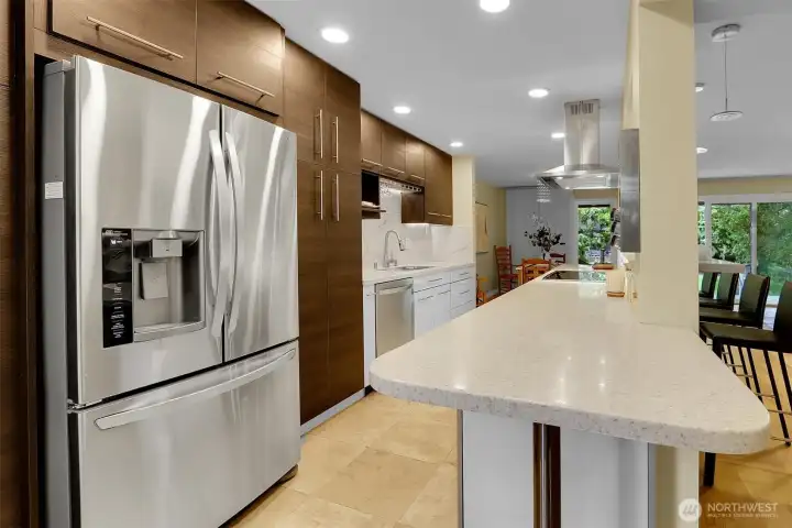 Gourmet chef inspired cabinets, flooring and lighting