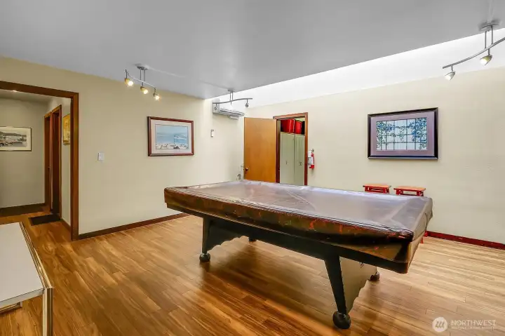 Workout room with equipment in back room