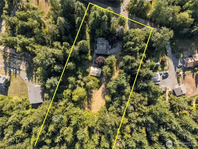 Approximate boundary lines shown for this 5-acre Arlington property. Buyer to verify all boundaries and land use to suit their needs.
