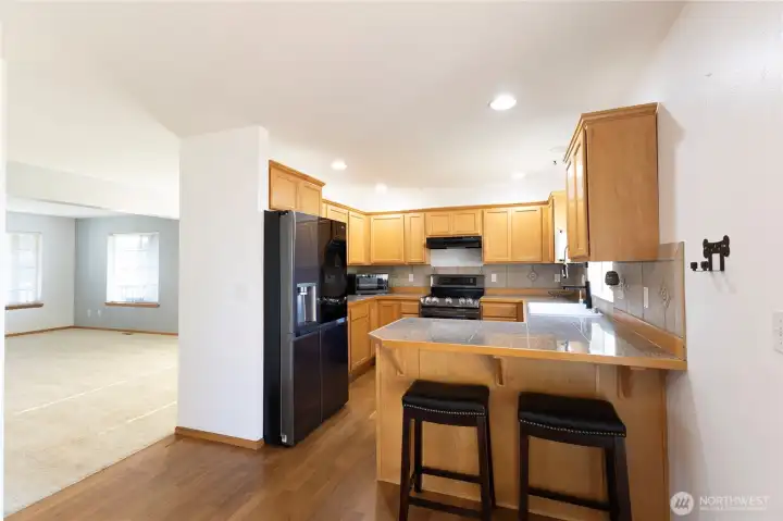 Breakfast Bar & Kitchen (w/ view of 1st Living Room)