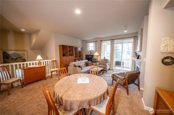 The dining area is large. Typically, the seller had the dining table extended with an insert and seated up to 10 people. With additional seating at the bar, plus room in the rec room/TV room, hosting large groups comfortably is easy in this home.