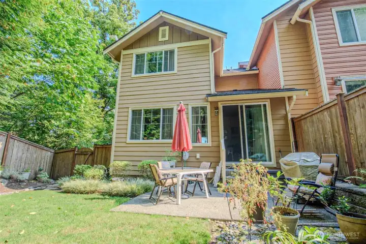 Spring is just around the corner, so why not share a photo of good things to come. The private backyard comes alive in the spring and summer as the leaves, shrubs and flowers burst into full bloom.