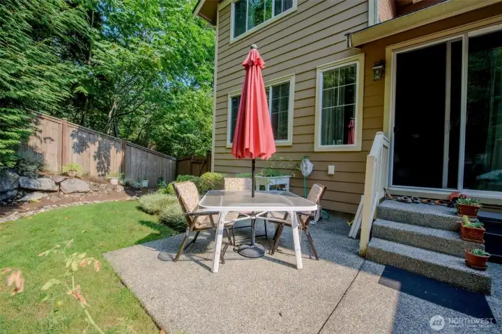 Enjoy al fresco dining on the backyard patio. During late spring, summer and early fall, the surrounding trees, full of foliage, offer privacy and cool shade. And no need to worry about raking leaves or mowing your lawn, your HOA dues cover all the landscaping maintenance!