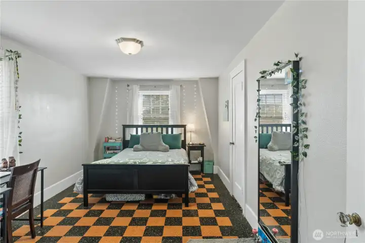 2nd bedroom with fun flooring